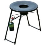 A black tripod with a fire extinguisher attached to it.